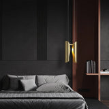 Mid-Century Modern inspired gold finish linear pendant for dining room or bar area.